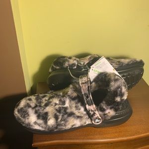 Animal print size 9 crocs.